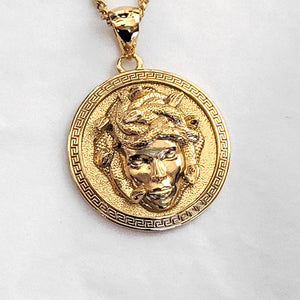 men's medusa pendant necklace in 14k and 18k gold, with a circular shape